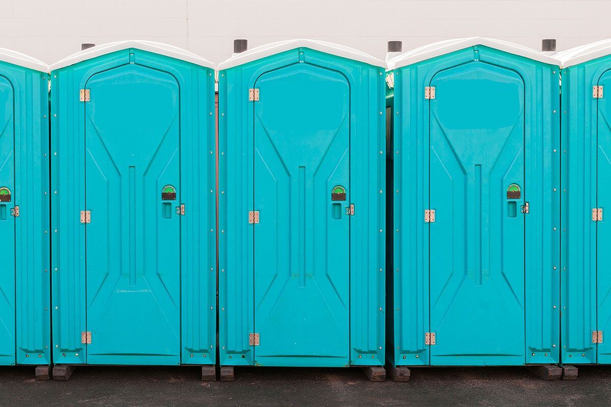 Industrial portable restroom units at a plant in Muskogee, Oklahoma